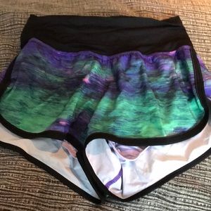 running shorts purple and green